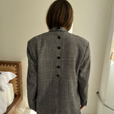 Double breasted black and white houndstooth button back blazer