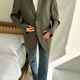 Green button back blazer